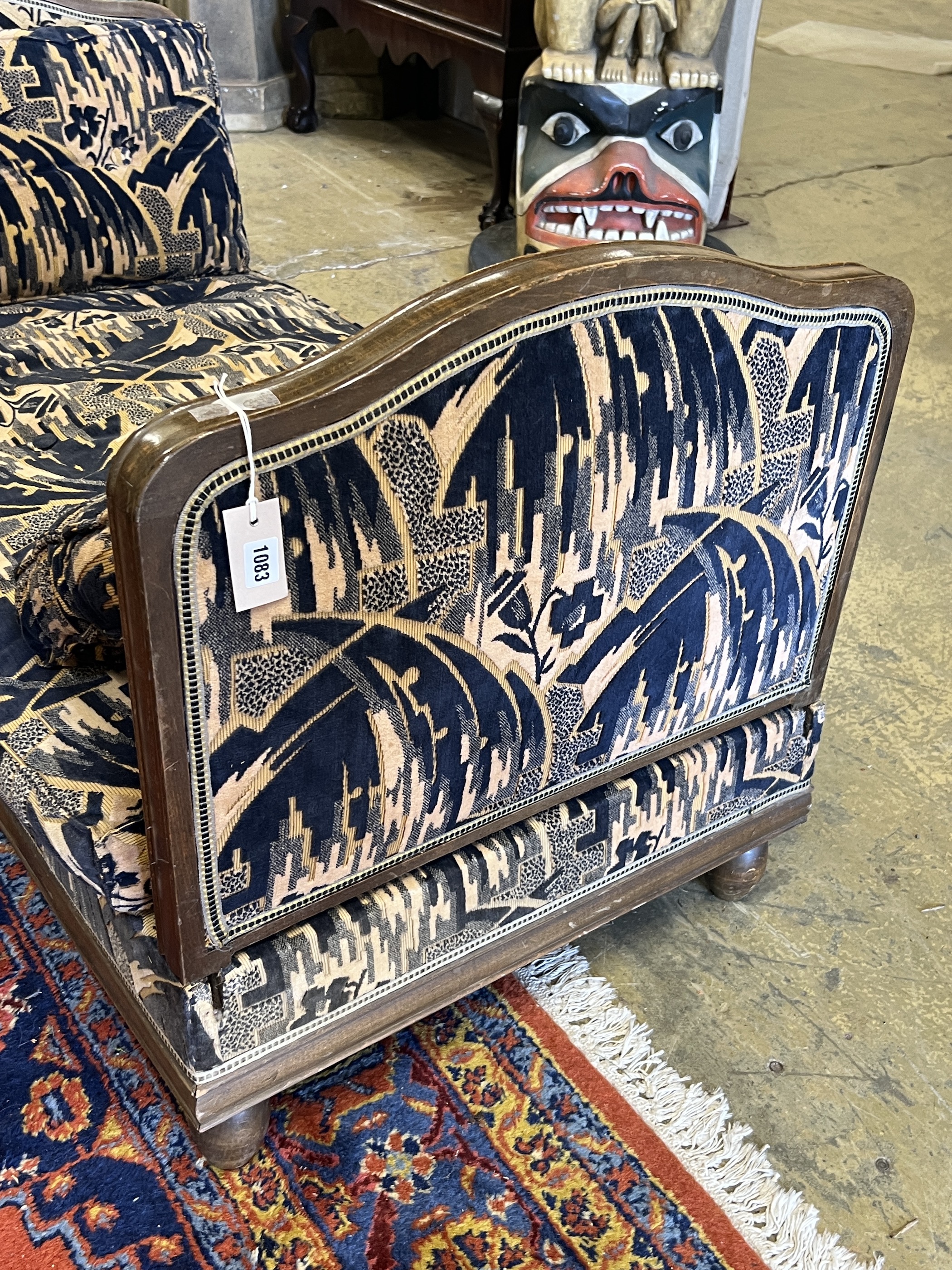 A French Art Deco beech daybed, length 130cm, depth 72cm, height 74cm